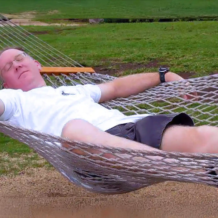 Man relaxing in hammoc