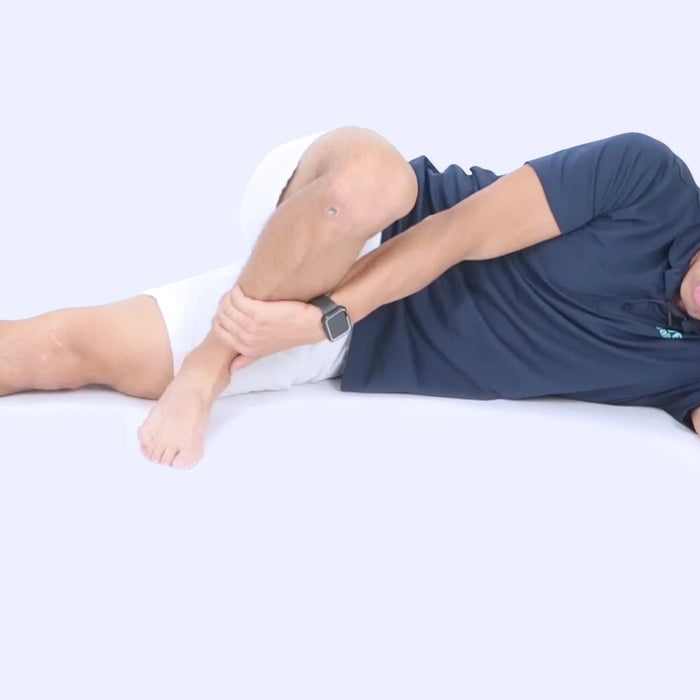 man stretching groin