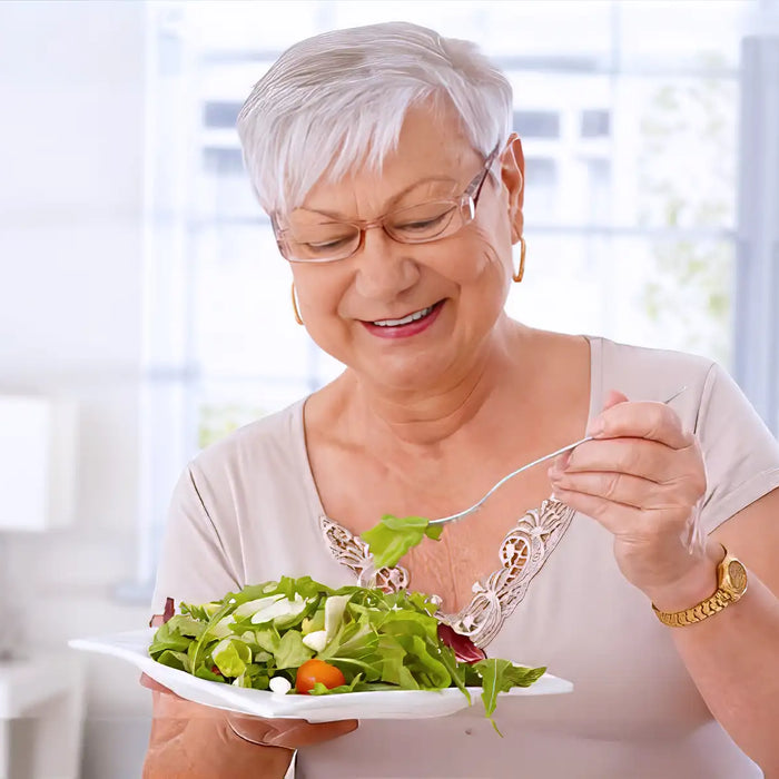 Senior woman eating healthy food