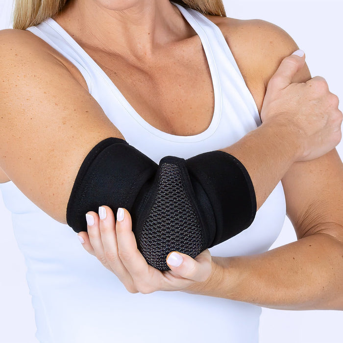 Woman wearing elbow brace