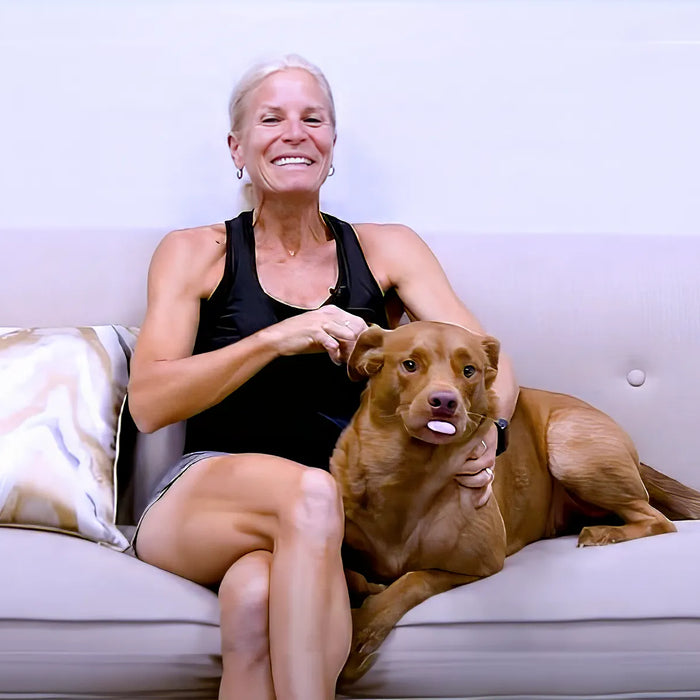 Woman and dog on a couch