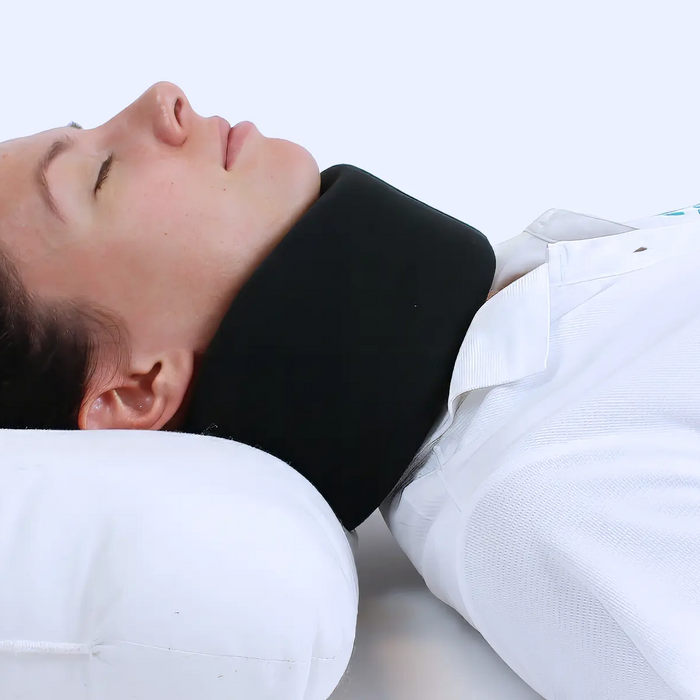 Woman sleeping in neck brace