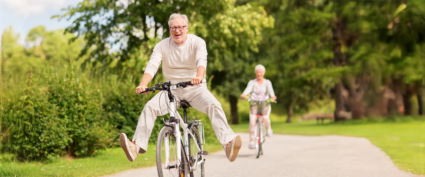 older man riding bike