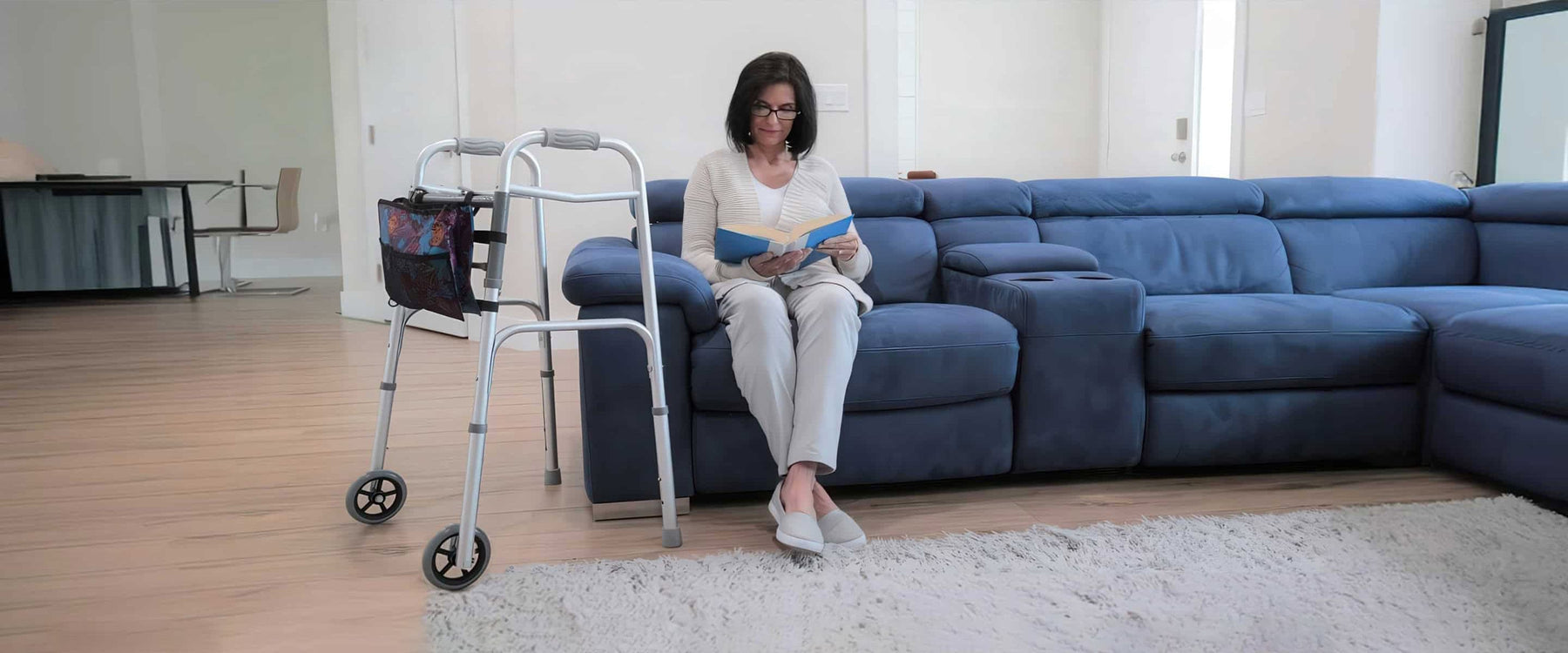 woman sitting with a walker