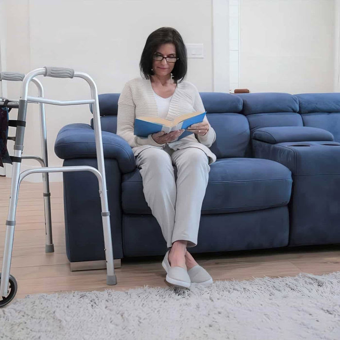 woman sitting with a walker